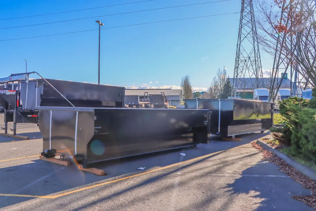 Roll-off dumpster ready for waste disposal at job site for 2 Yard Dumpster Rental in Modesto